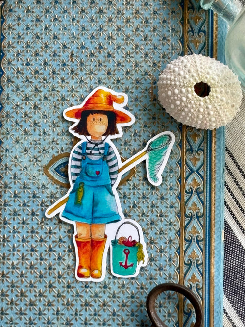 Autocollant sorcière a la plage