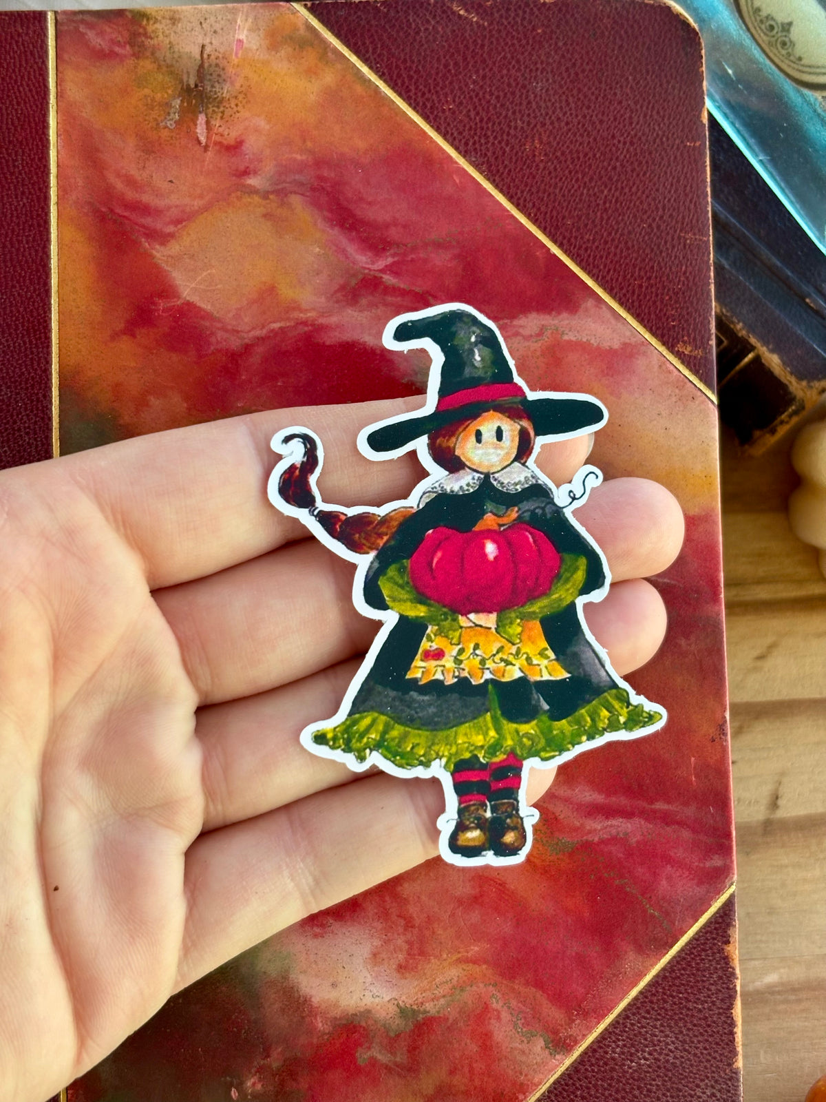 Autocollant sorcière d’automne