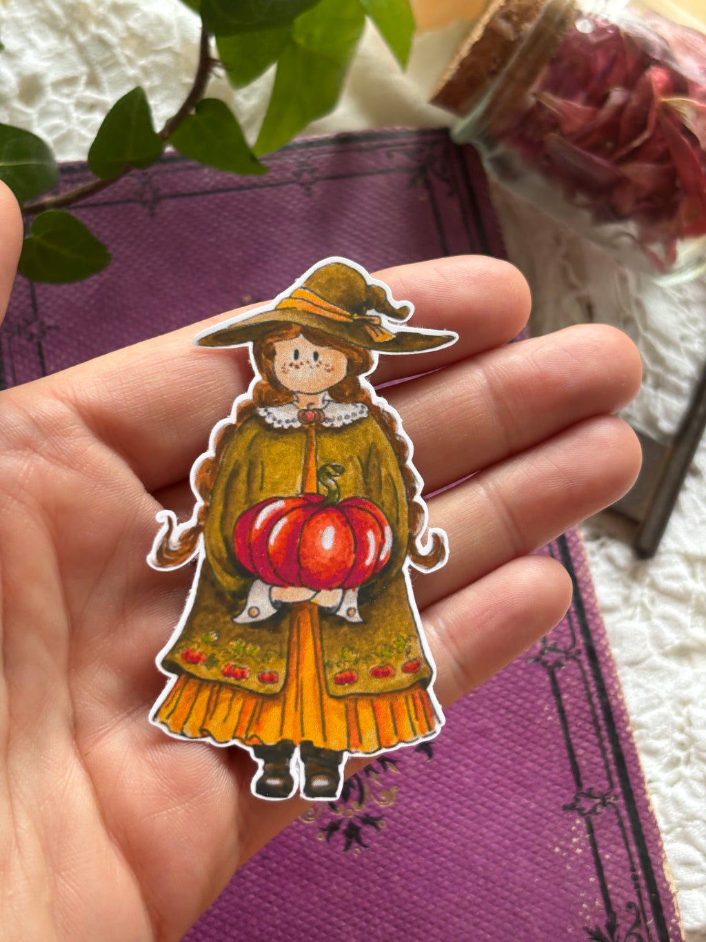 Autocollant sorcière a la citrouille