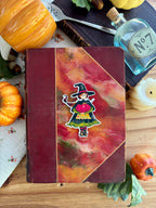 Autocollant sorcière d’automne